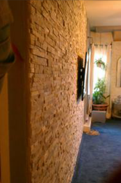 decorative cultured stone wall inside residential home