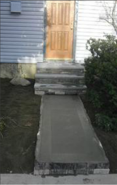 concrete walkway and stone stairway residential