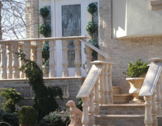 stone stairway with decorative railings