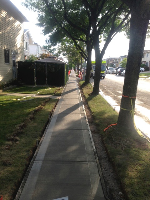 sidewalk on whole residential block newly paved