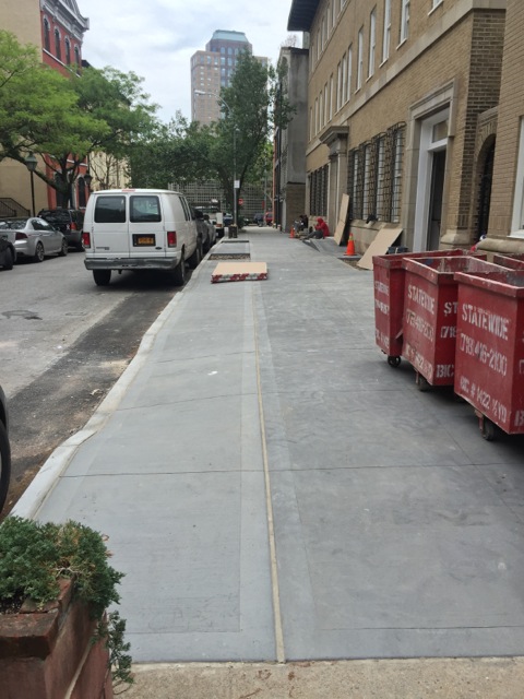 driveway and sidewalk installed by commercial building